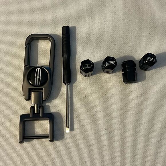 Lincoln Logo Key Fob Keychain in Metal and Valve Stem Caps in Black set of 4 NWT - Picture 1 of 5